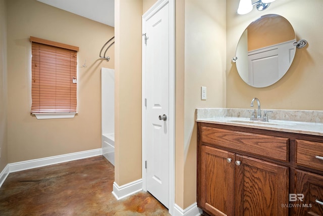 bathroom with  shower combination, concrete flooring, and vanity