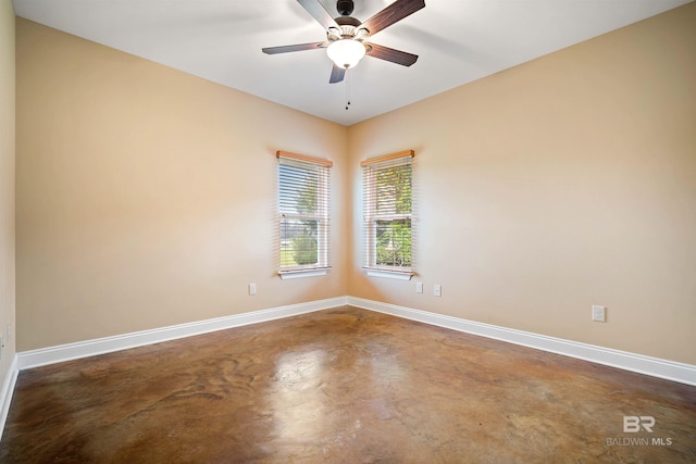 unfurnished room with ceiling fan