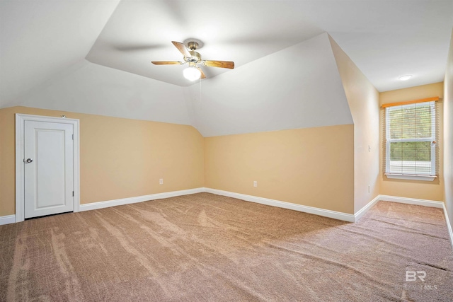 bonus room featuring vaulted ceiling, ceiling fan, and carpet floors