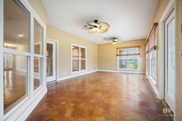 unfurnished sunroom with french doors and ceiling fan