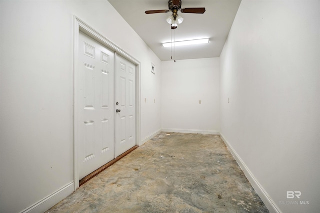 interior space featuring ceiling fan