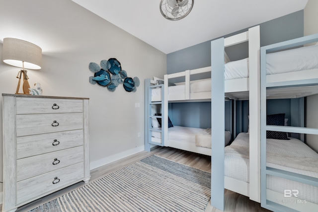 3214 Dolphin Dr, Gulf Shores, AL 36542 - bedroom with wood finished floors and baseboards
