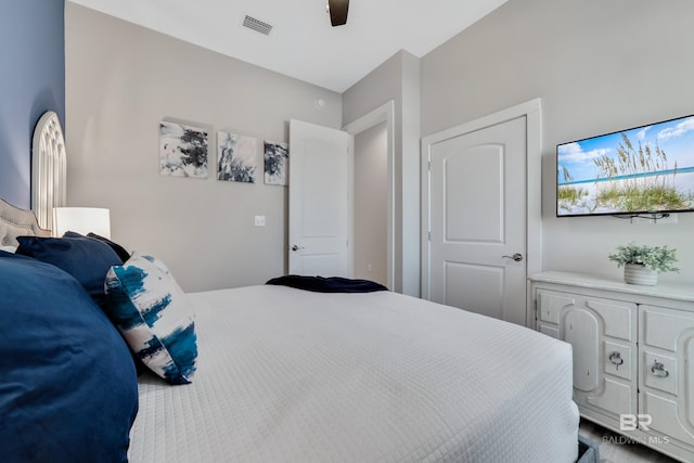 3214 Dolphin Dr, Gulf Shores, AL 36542 - bedroom with visible vents and a ceiling fan