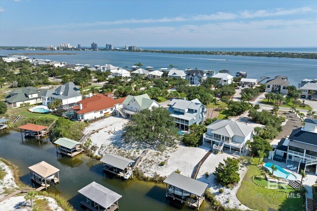 bird's eye view with a water view