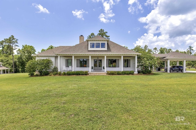 21151 Caveletti Cir, Fairhope, AL 36532 - view of front of home featuring a front lawn, a gazebo, a chimney, a shingled roof, and french doors