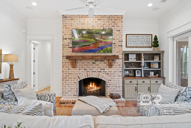 21151 Caveletti Cir, Fairhope, AL 36532 - living area featuring wood finished floors, ceiling fan, a fireplace, and recessed lighting