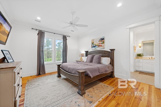 21151 Caveletti Cir, Fairhope, AL 36532 - bedroom featuring light wood-style flooring, recessed lighting, ensuite bath, crown molding, and ceiling fan