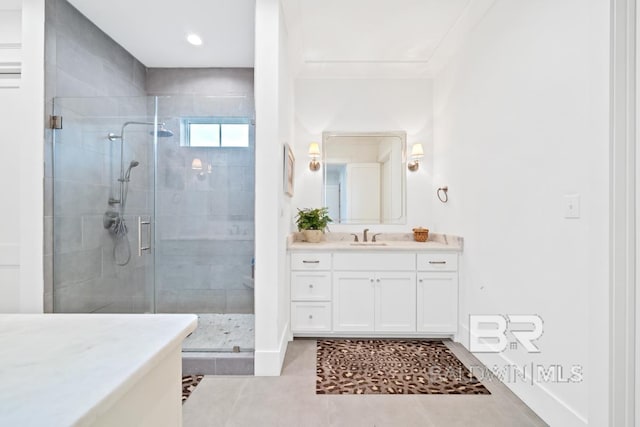 21151 Caveletti Cir, Fairhope, AL 36532 - bathroom featuring vanity, a shower stall, and tile patterned floors