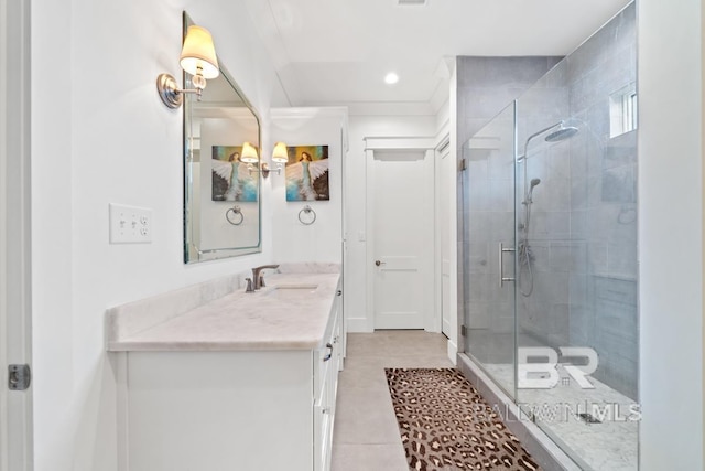 21151 Caveletti Cir, Fairhope, AL 36532 - bathroom featuring vanity, a stall shower, tile patterned flooring, and recessed lighting
