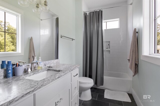 21151 Caveletti Cir, Fairhope, AL 36532 - bathroom with vanity, tile patterned floors, and shower / tub combo