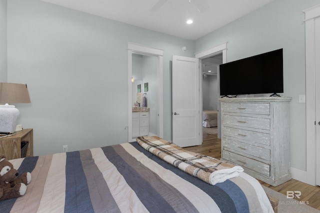 21151 Caveletti Cir, Fairhope, AL 36532 - bedroom featuring wood finished floors, ensuite bathroom, a ceiling fan, and recessed lighting