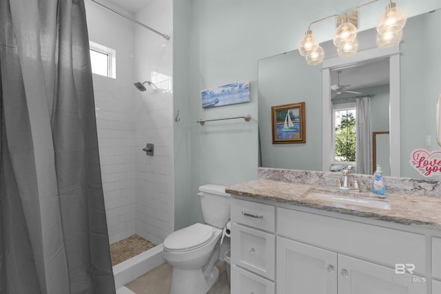 21151 Caveletti Cir, Fairhope, AL 36532 - full bath featuring vanity, plenty of natural light, a tile shower, and ceiling fan