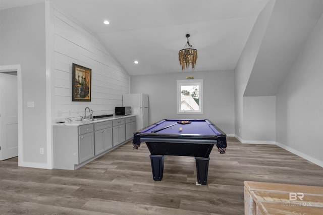 21151 Caveletti Cir, Fairhope, AL 36532 - rec room featuring vaulted ceiling, bar with sink, light wood-style floors, billiards table, and recessed lighting