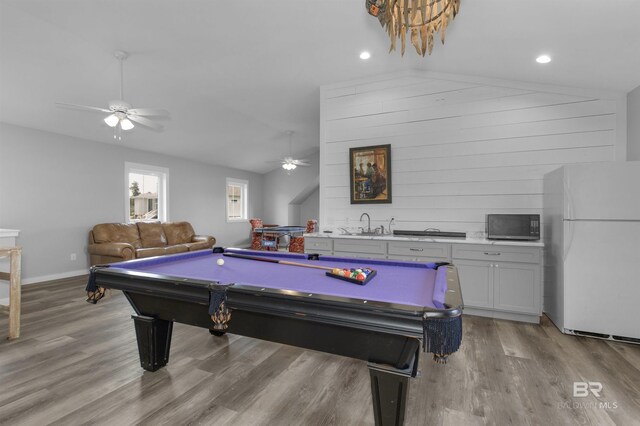 21151 Caveletti Cir, Fairhope, AL 36532 - game room with ceiling fan, light wood finished floors, billiards table, vaulted ceiling, and recessed lighting