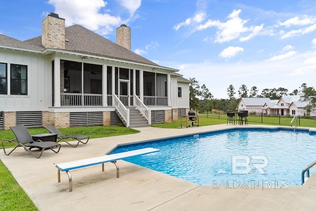 21151 Caveletti Cir, Fairhope, AL 36532 - view of swimming pool with a sunroom, a patio, a diving board, and stairs