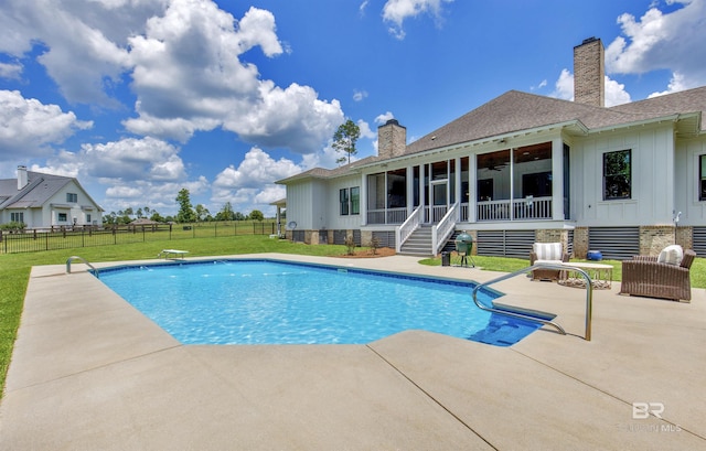 21151 Caveletti Cir, Fairhope, AL 36532 - view of swimming pool with a sunroom, ceiling fan, and a patio area