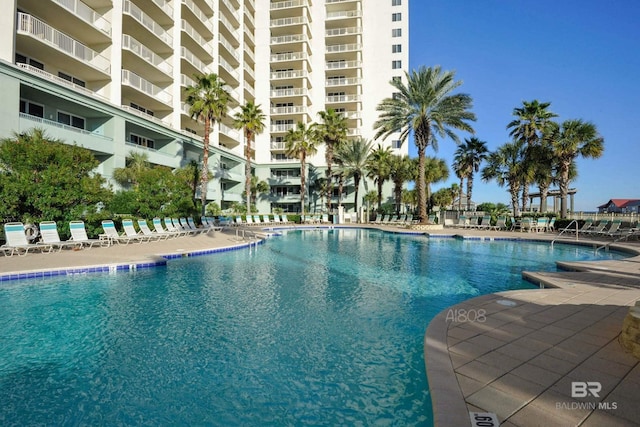 community pool with a patio