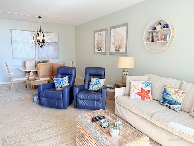 living area with light tile patterned floors, baseboards, and a notable chandelier