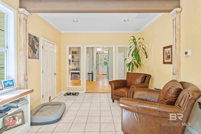 tiled living room featuring crown molding