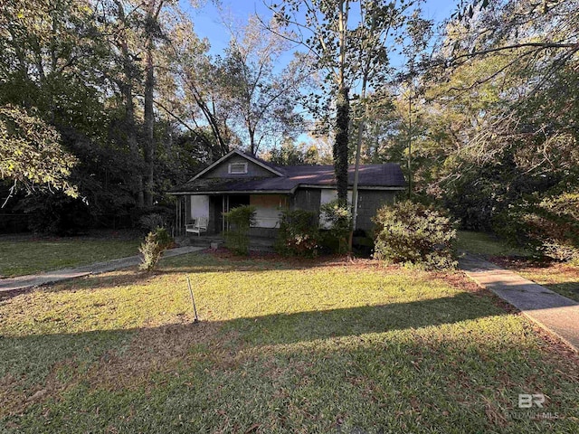 view of front of home with a front yard