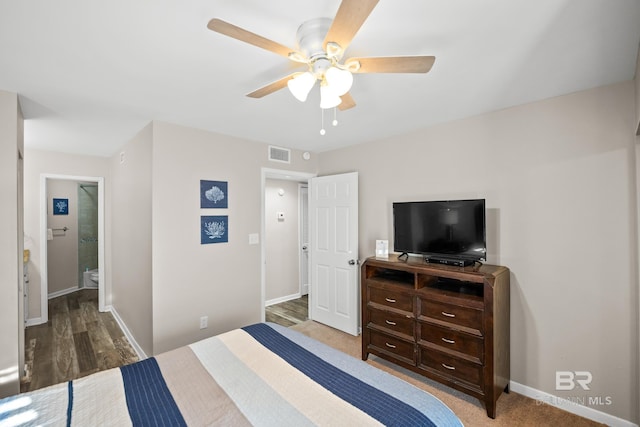 bedroom featuring baseboards, visible vents, and ceiling fan