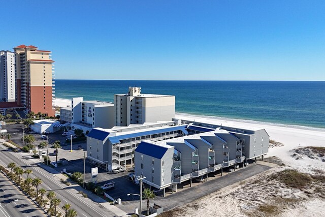 aerial view featuring a water view and a view of the beach