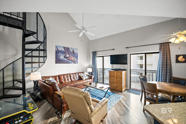 living room with high vaulted ceiling, wood finished floors, and a ceiling fan