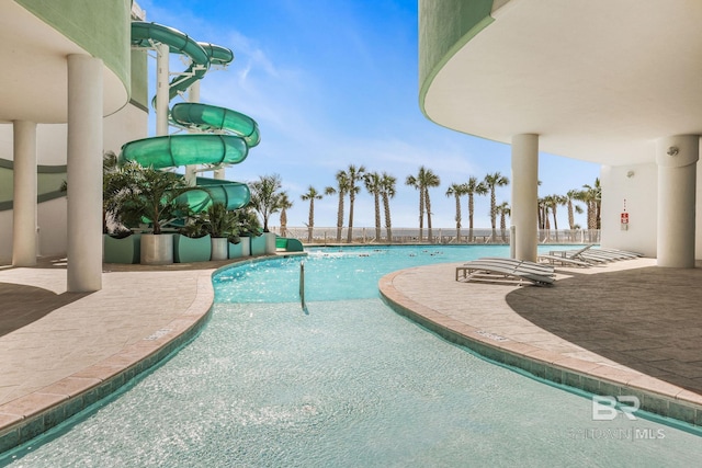 26302 Perdido Beach Blvd Unit D2301, Orange Beach, AL 36561 - community pool featuring a water slide and a patio