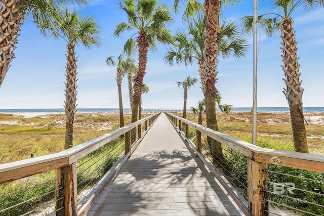 view of community featuring a water view and a view of the beach