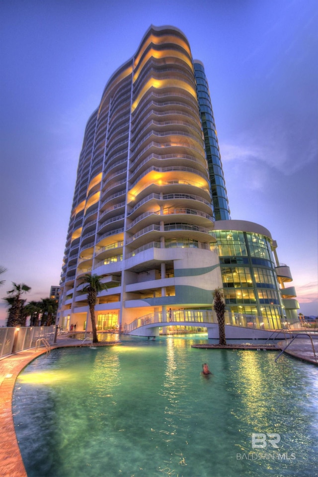 26302 Perdido Beach Blvd Unit D2301, Orange Beach, AL 36561 - view of pool at dusk