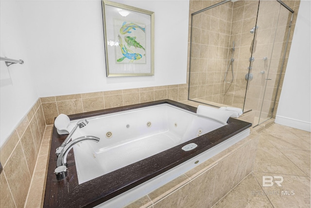 bathroom featuring tile patterned floors and separate shower and tub