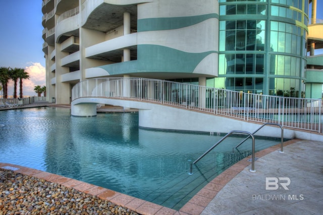 26302 Perdido Beach Blvd Unit D2301, Orange Beach, AL 36561 - view of swimming pool with fence