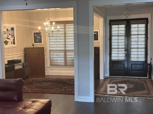 3872 Stafford Blvd, Gulf Shores, AL 36542 - entryway with a chandelier, wood finished floors, and french doors