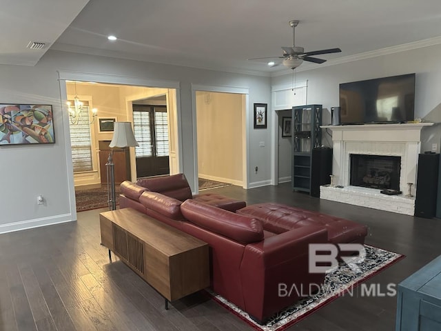 3872 Stafford Blvd, Gulf Shores, AL 36542 - living area featuring a ceiling fan, wood finished floors, recessed lighting, crown molding, and a fireplace