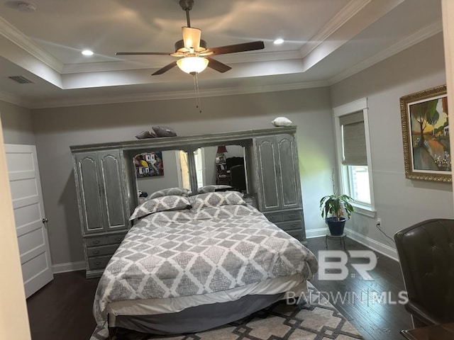 3872 Stafford Blvd, Gulf Shores, AL 36542 - bedroom featuring a raised ceiling, dark wood finished floors, ornamental molding, and ceiling fan