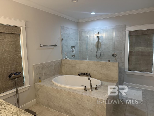 3872 Stafford Blvd, Gulf Shores, AL 36542 - bathroom featuring a garden tub, a walk in shower, tile patterned flooring, crown molding, and recessed lighting
