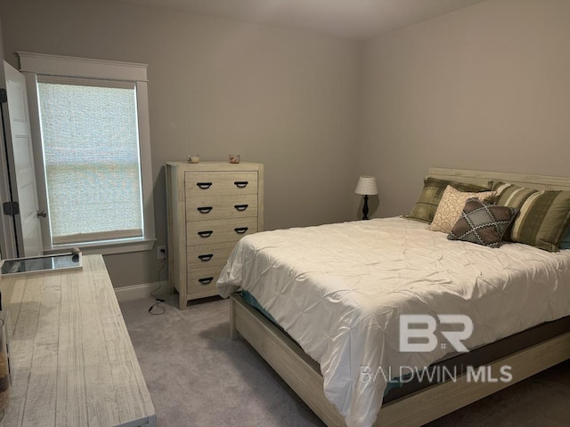 3872 Stafford Blvd, Gulf Shores, AL 36542 - carpeted bedroom featuring baseboards