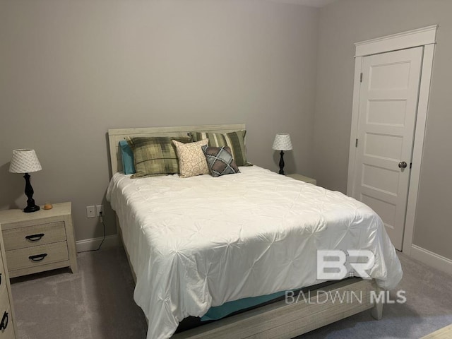 3872 Stafford Blvd, Gulf Shores, AL 36542 - carpeted bedroom featuring baseboards