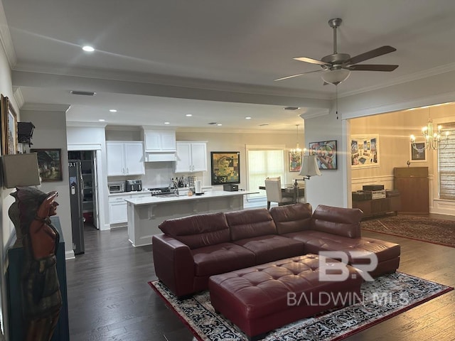 3872 Stafford Blvd, Gulf Shores, AL 36542 - living area featuring a chandelier, dark wood-type flooring, ceiling fan, ornamental molding, and recessed lighting