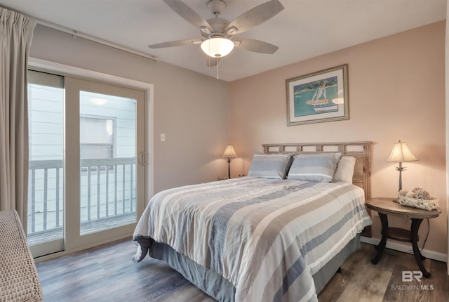 bedroom featuring access to exterior, dark hardwood / wood-style flooring, and ceiling fan