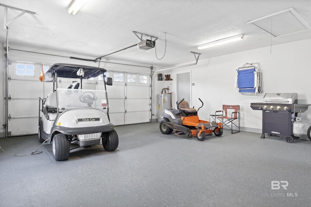 garage with electric water heater and a garage door opener