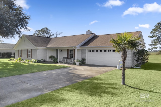 ranch-style home with a front yard and a garage