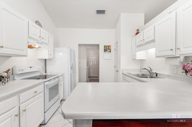 kitchen featuring white electric range oven, sink, white cabinets, and light tile patterned floors