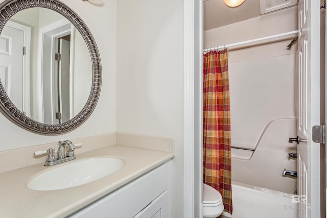 full bath with shower / bath combo with shower curtain, toilet, and vanity