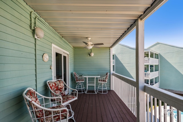 wooden terrace with ceiling fan