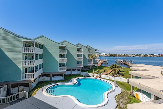 community pool featuring a water view