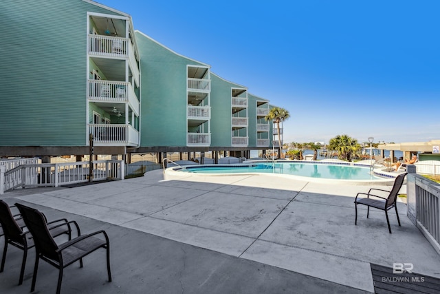 pool with a patio area