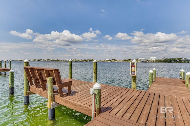 view of dock with a water view