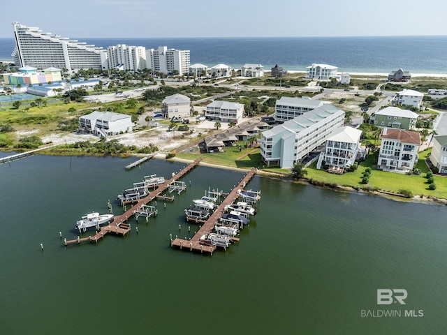 birds eye view of property featuring a water view