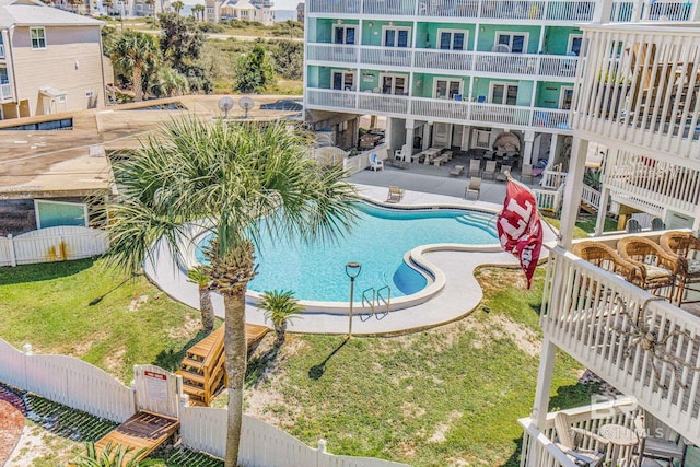 pool featuring stairway, a patio area, and fence private yard